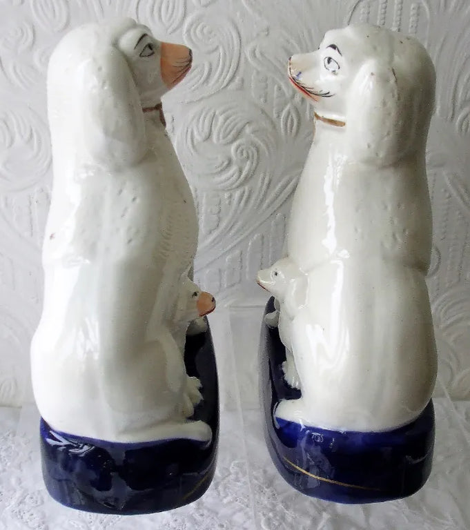 Pair of Antique English Victorian Staffordshire Pottery Poodles with Pups