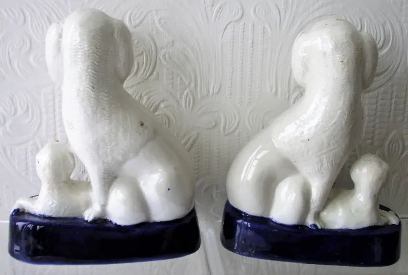 Pair of Antique English Victorian Staffordshire Pottery Poodles with Pups