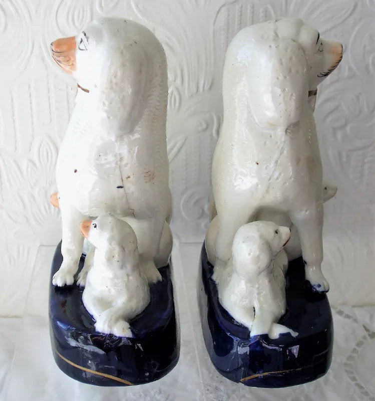 Pair of Antique English Victorian Staffordshire Pottery Poodles with Pups