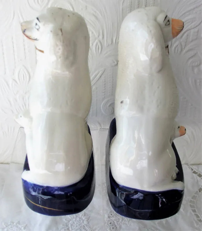 Pair of Antique English Victorian Staffordshire Pottery Poodles with Pups
