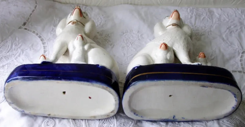 Pair of Antique English Victorian Staffordshire Pottery Poodles with Pups