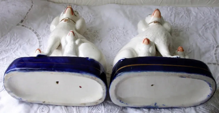 Pair of Antique English Victorian Staffordshire Pottery Poodles with Pups