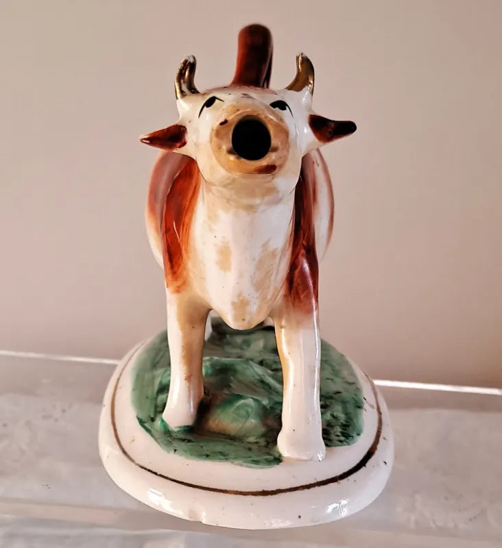 Pair of Antique Victorian Staffordshire Cow Creamers