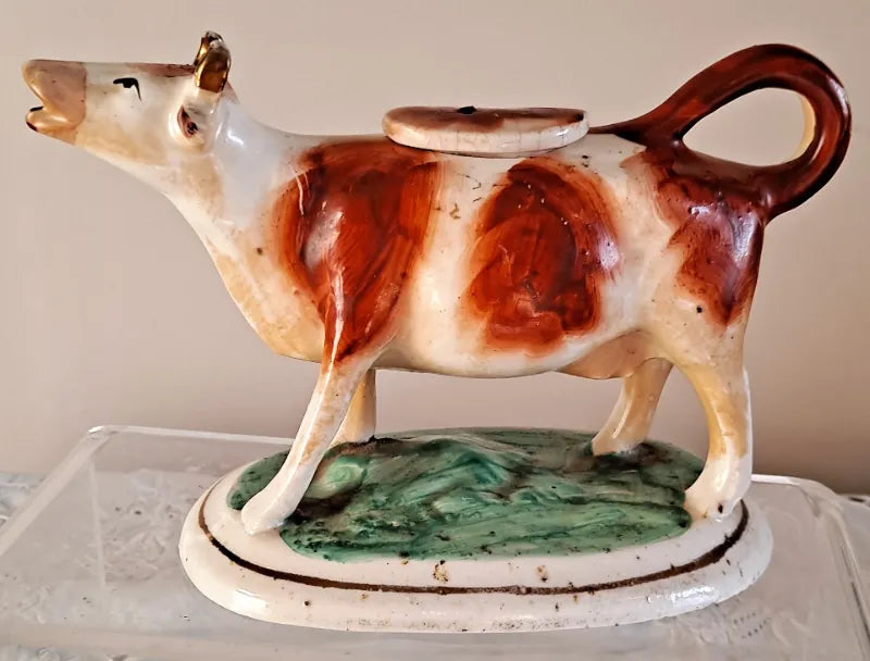 Pair of Antique Victorian Staffordshire Cow Creamers