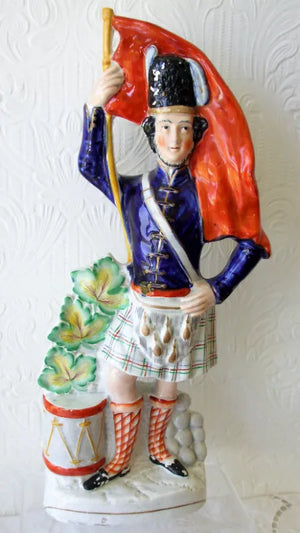 Victorian Staffordshire Figure ~ "Scottish Soldier with Flag"